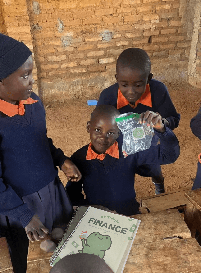 Students with financial literacy workbooks
